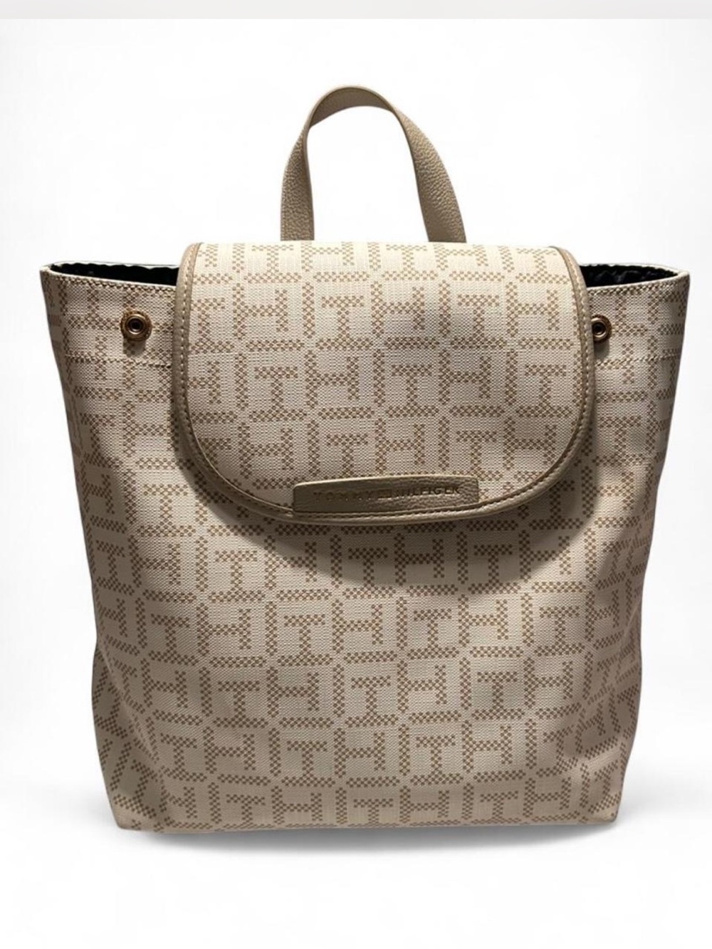 Tommy Hilfiger monogram jacquard dome backpack in a white and beige pattern